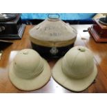An Allibhoy Vallijee & Sons steel hat box & two Hawkes & Co. British pith helmets belonging to Major