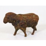 A c.1900 cast iron sheep money box