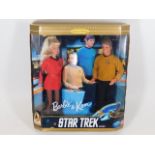 A Barbie & Ken Star Trek boxed figure set