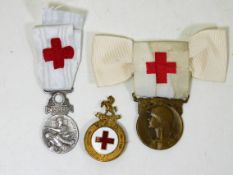 Three military red cross badges including French &
