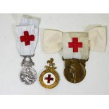 Three military red cross badges including French &