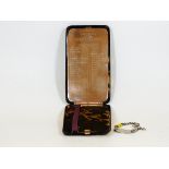A tortoiseshell cigarette case inlaid with large 9ct gold plaque with inscription presented to E. M.
