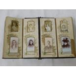 A Victorian photograph card album