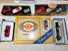 Four Matchbox Dinky boxed diecast vehicles & sets