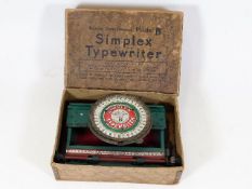 A vintage boxed Simplex Typewriter