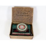 A vintage boxed Simplex Typewriter