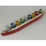 A painted wooden vintage pull along childs toy