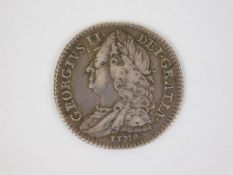 A silver George II Lima shilling