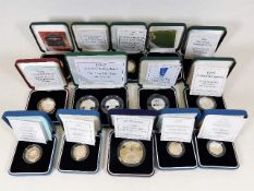 Fourteen silver proof coin sets comprising seven £