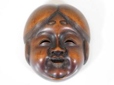 A Meiji period Japanese carved inroe