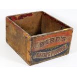 An early 20thC. wooden box advertising Bird's baki