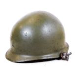 A post WWII M1 style helmet, probably Austrian