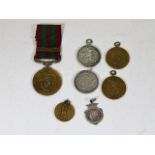 A small quantity of sporting medals won by T. Hard