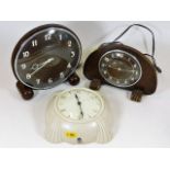 Two art deco style electric clocks with bakelite m
