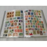 A world stamp album, mostly mint