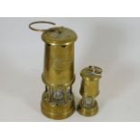 Two brass miners lamps