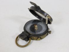 A 1918 S. Mordan & Co brass WW1 compass with Edinb