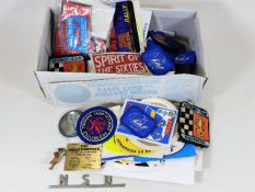 A boxed quantity of motorcycle badges & related it