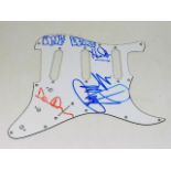 A Pink Floyd hand signed Fender fret scratchplate,