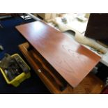 An oak trestle coffee table