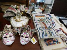 Three Venetian masks twinned with three pieces of