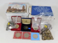 A quantity of coin sets & other coinage