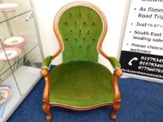 A 19thC. style upholstered armchair