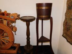 An early 20thC. brass bound oak planter & stand tw