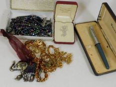 A Parker pen & a small quantity of costume jewelle