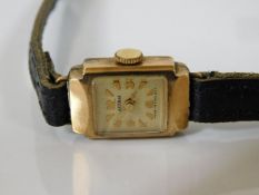 A 9ct gold cased watch