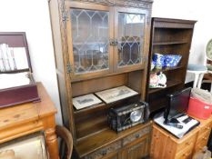 A glazed oak dresser with drawers & cupboard under