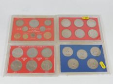 Four vintage coin sets