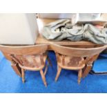 A cleated end pine table with four chairs