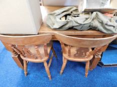 A cleated end pine table with four chairs