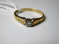 A 9ct gold diamond solitaire