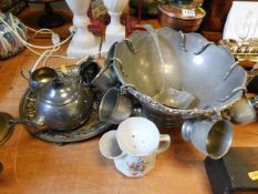 A silver plated punch bowl with ladle & cups twinn