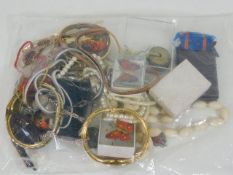 A bagged quantity of costume jewellery