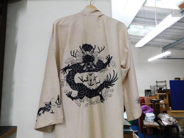 A Chinese silk robe with dragon decor