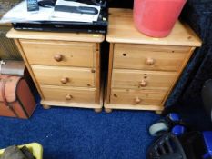 A pair of pine bedside cabinets with drawers