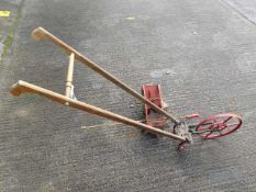 A USA made manual cultivator twinned with a vintag