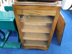 A small glazed oak bookcase