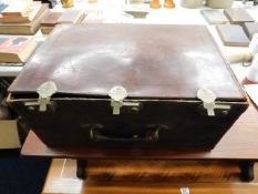 A Thomas Keane leather suitcase