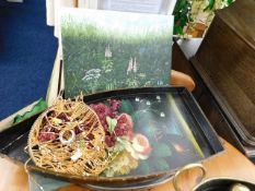 A decorative oil of floral scene, a painted tray,