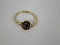 A small ladies 9ct ring with sapphires a/f