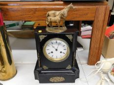 A late Victorian mantel clock with gilt horse fini