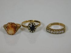 Three 9ct gold rings with stones