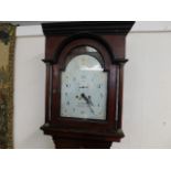 A large mahogany cased longcase clock with painted