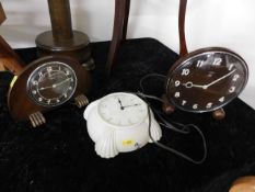 Three bakelite clocks & two vintage cameras