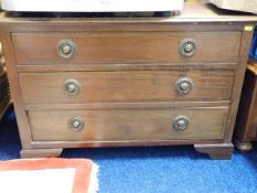 A Regency style chest of three drawers