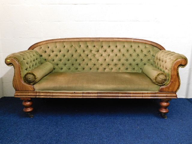 A Victorian upholstered chesterfield sofa